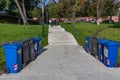 Footpath with different trash cans for recycle garbage