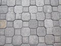 Pavement stone background. Texture of paving stones laid on a city street Royalty Free Stock Photo
