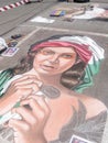 Pavement street artist painting