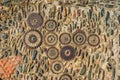 Pavement texture with gears and bricks in Montjuic, Barcelona, Spain