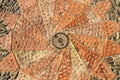 Pavement texture with gears and bricks in Montjuic, Barcelona, Spain. Royalty Free Stock Photo