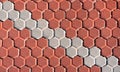 Pavement with white and red hexagon pattern. Cement sidewalk with texture. Background, texture Royalty Free Stock Photo