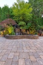 Paver Brick Patio with Waterfall Pond Royalty Free Stock Photo