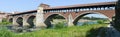 Pavia, Italy: Covered bridge over the river Ticino. Royalty Free Stock Photo