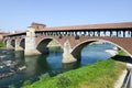 Pavia, Italy: Covered bridge over the river Ticino. Royalty Free Stock Photo