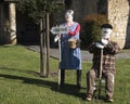 Couple of straw scarecrow dolls at the gardens fair