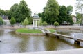 Pavilion in the center of a pond  in the city park of Liepaja in Latvia Royalty Free Stock Photo