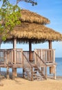 Pavilion in natural style on a beach. Royalty Free Stock Photo