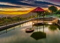 Pavilion on the pond at sunset Royalty Free Stock Photo