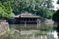 Pavilion by the pond at the Tomb of the Emperor Tu Duc in Hue city Royalty Free Stock Photo