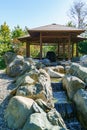 Pavilion where the stream begins in Japanese garden in Public landscape park of Krasnodar or Galician park, Russia Royalty Free Stock Photo