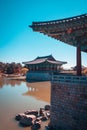The pavilions of Anapji Pond reflected in the water in Gyeongju, South Korea. Teal and orange view. Royalty Free Stock Photo