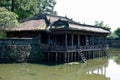 Pavillon by the pond on the site of the Tomb of the Emperor Tu Duc in Hue city Royalty Free Stock Photo