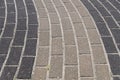 Paving decorative dark and light tiles