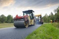 Paving machine crew at road-works Royalty Free Stock Photo