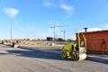 Paving roller machine during road work. Mini road roller at construction site for paving works. Screeding the sand for road Royalty Free Stock Photo