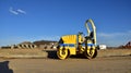 Paving roller machine during road work. Mini road roller at construction site for paving works. Screeding the sand for road Royalty Free Stock Photo