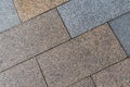 Paving slabs brown and gray stone background closeup urban pattern