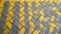 Paving slabs are installed in a zig zag manner with yellow lines marked in the supermarket parking lot