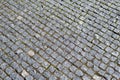 Paving stone background. Paved road. Cobblestone surface