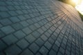 Paving stone path goes away the prospect in sunset Royalty Free Stock Photo