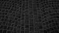 Paving stones in an ancient square in the city. Black background with gray pattern. Monochrome image Royalty Free Stock Photo