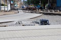 Paving stones on city street, tram rails repair Royalty Free Stock Photo