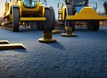 Paving, Surfacing, and Tamping Equipment Operators Fictional Work Enviroment Scene.