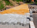 Paving work in road construction Construction site