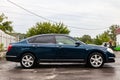 Blue Nissan Teana 2007 year side view with dark black interior in excellent condition on the parking