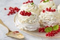 Pavlova cakes with cream and fresh summer berries. Close up of Pavlova dessert with forest fruit and mint. Food photo Royalty Free Stock Photo