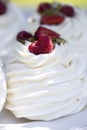 Pavlova cakes with cream and fresh summer berries. Pavlova cakes Royalty Free Stock Photo