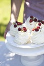 Pavlova cakes with cream and fresh summer berries. Pavlova cakes Royalty Free Stock Photo