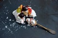 A Pavlova dessert with fruit and jam Royalty Free Stock Photo