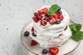 pavlova layer cake with Meringue, Whipped Cream, and Fresh Berries Royalty Free Stock Photo