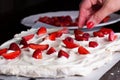 Pavlova - meringue cake with fresh strawberries. Royalty Free Stock Photo