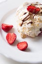 Pavlova - meringue cake with fresh strawberries. Royalty Free Stock Photo