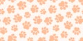 Paw cat or dog seamless pattern, pet foot peach print, animal background. Bear, panda, tiger step texture, grunge stamp repeat Royalty Free Stock Photo