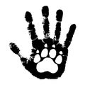 Paw of animal on human palm Royalty Free Stock Photo