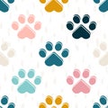 Paws or footprints of cats and dogs on a white background create a cute seamless pattern