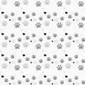 Paw print and heart seamless. Traces of Cat Textile Pattern. Cat footprint seamless pattern. Vector seamless Royalty Free Stock Photo