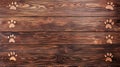 Paw prints on dark wood background, rustic texture, pet banner Royalty Free Stock Photo