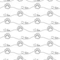 Paw seamless pattern. Repeating cute pet dog or cat background. Repeated modern footprint design for prints. Sample texture black