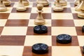 Pawn and checkers piece in center of playfield Royalty Free Stock Photo