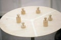 Pawns on round table