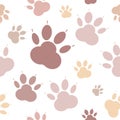 Paws pattern. Silhouettes of paws, cats feet, dogs footprint. Pastel pink, nude on a transparent background. Seamless