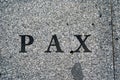 pax writen on marble