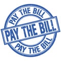 PAY THE BILL written word on blue stamp sign Royalty Free Stock Photo