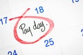Pay day on calendar. Royalty Free Stock Photo