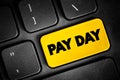 Pay Day is a specified day of the week or month when one is paid, text concept button on keyboard Royalty Free Stock Photo